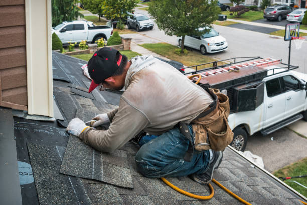 Professional Roofing technician working in Davis, CA